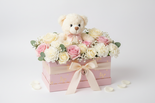 Baby girl teddy box filled with flowers